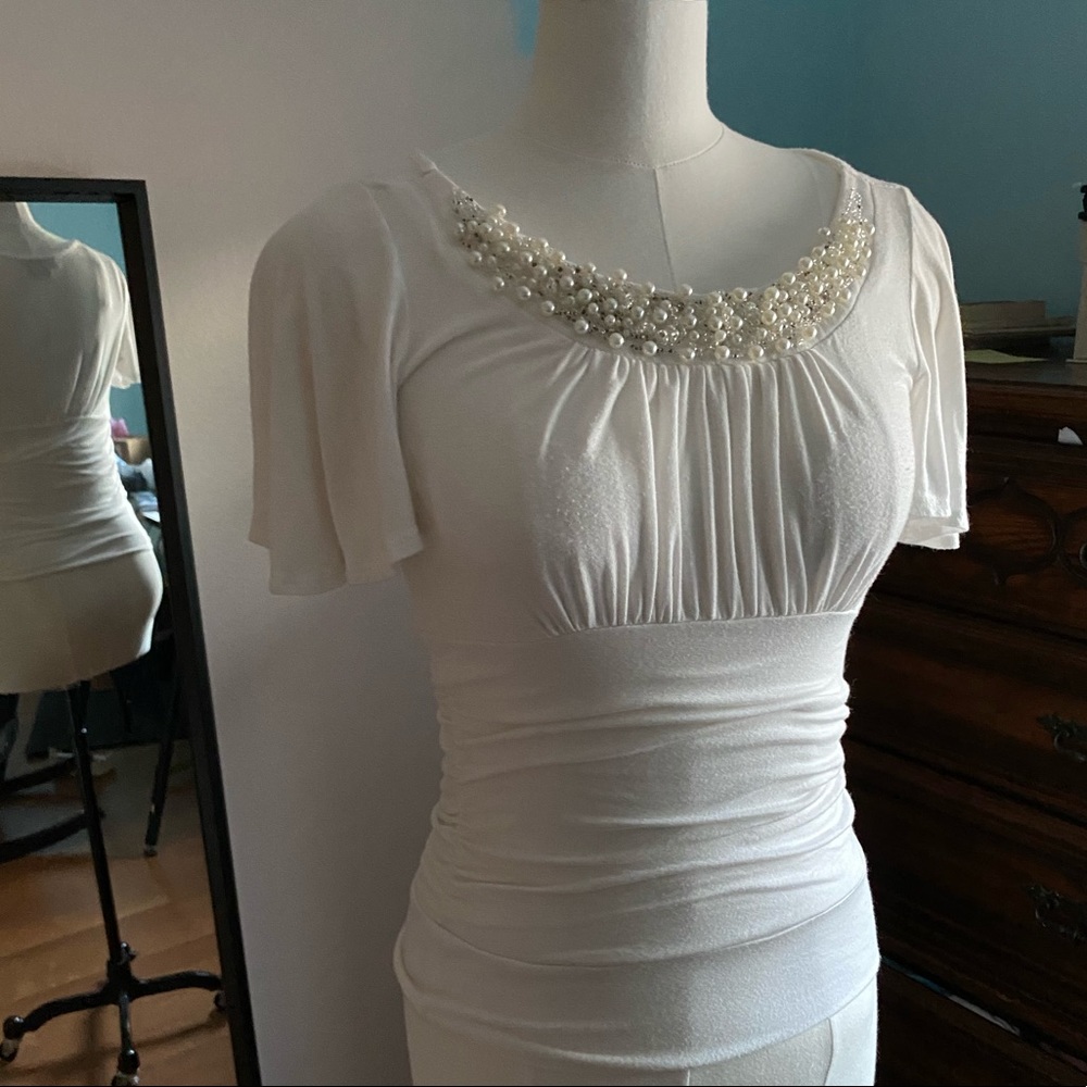 Statement neckline flattering top